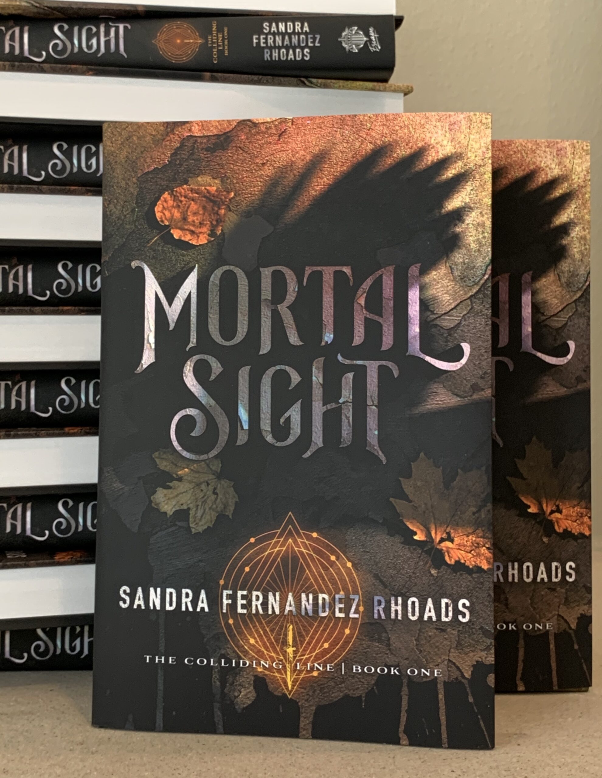 Standing Mortal Sight Book for Sandra Fernandez Rhoads Press Kit